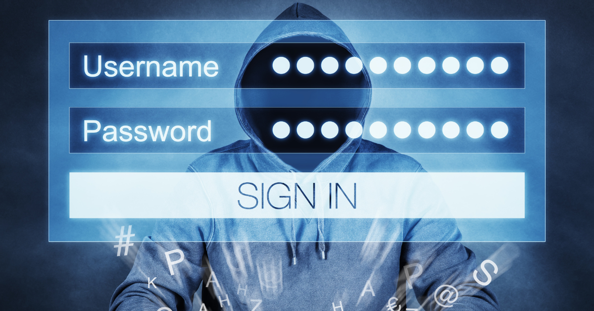 Hacker behind a username and password login screen